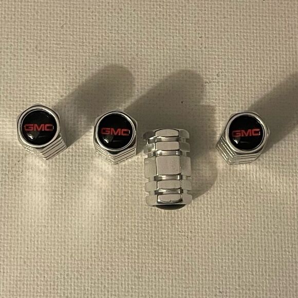 GMC Logo valve Stem caps in Silver set of 4 NWT - Picture 1 of 4